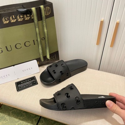 Gucci Women Slide Sandals in Black Rubber GG