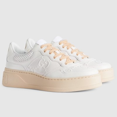 Gucci Women Sneakers In White GG Embossed Calfskin